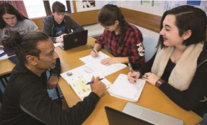 School Evaluation Indicators students working together at table.jfif